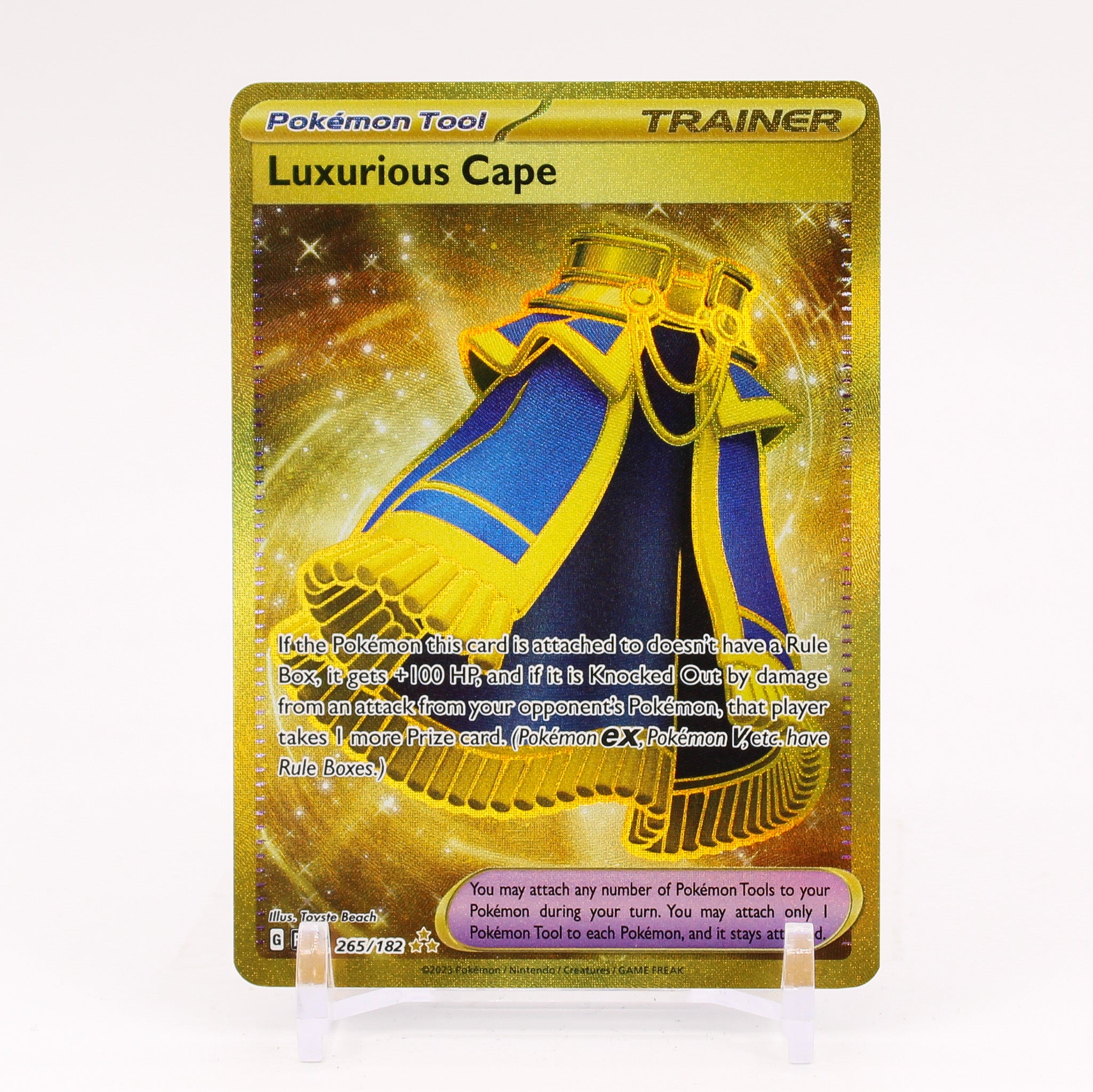 Luxurious Cape - 265/182 Paradox Rift Gold Trainer - NM/MINT