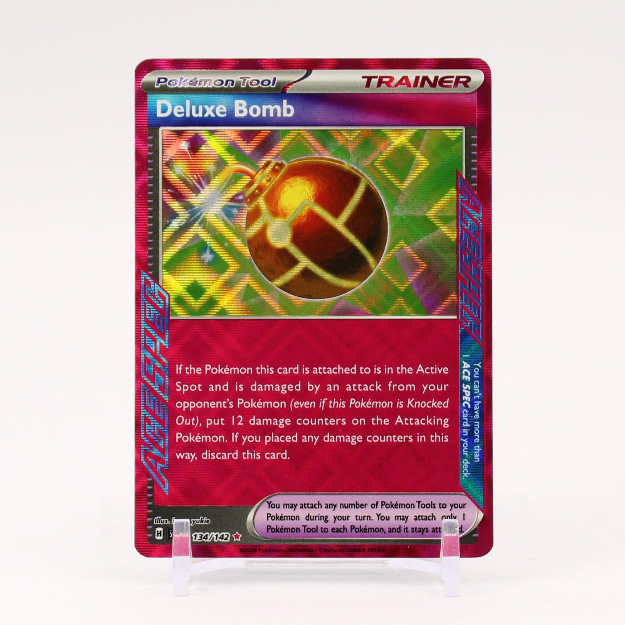 Deluxe Bomb - 134/142 Stellar Crown ACESPEC Holo Rare Trainer - NM/MINT